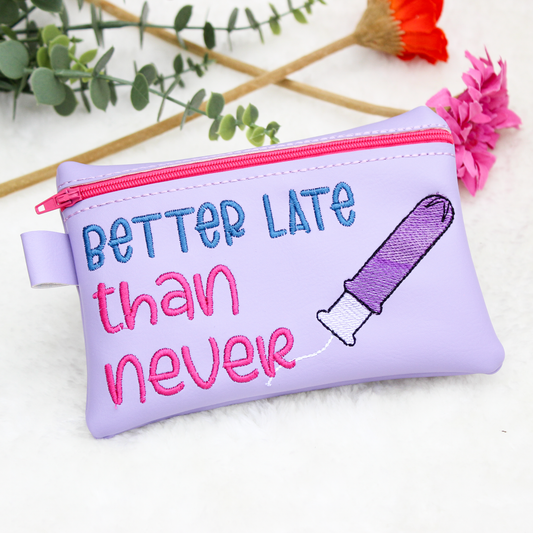 small period pouch bag with better late than never text on a white background